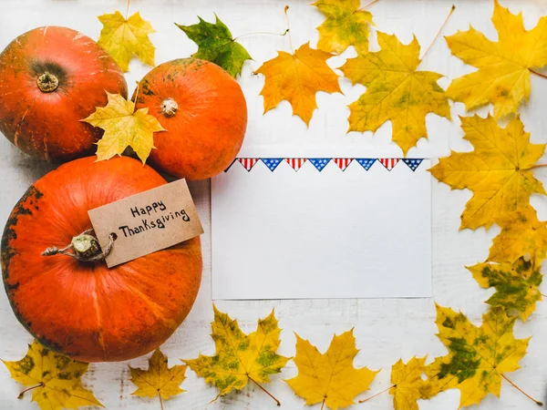 Thanksgiving greeting card, pumpkins and autumn leaves — Stock Photo, Image