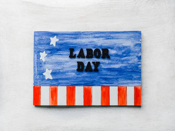 Beautiful card with congratulations on Labor Day
