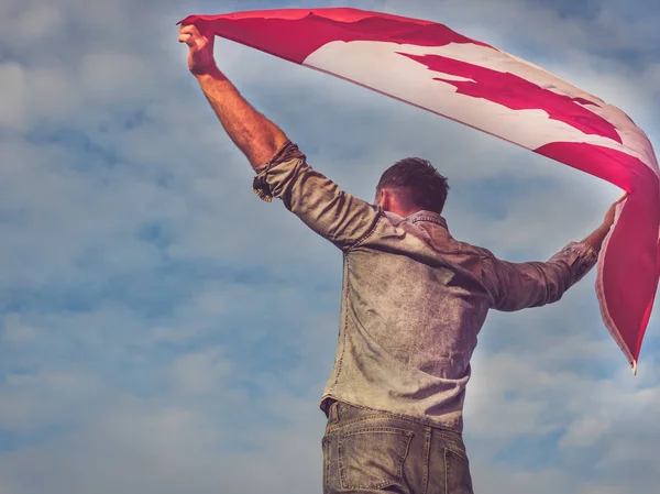 Man waving a Canadian Flag. National holiday — Stock Photo, Image