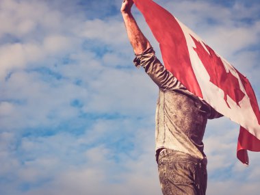 Man waving a Canadian Flag. National holiday clipart