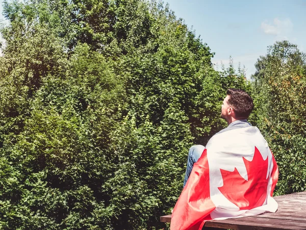 Man holding a Canadian Flag. National holiday — Stock Photo, Image