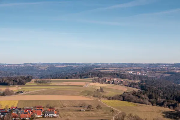 Little village in the middle of the german countryside with fore — Stock Photo, Image