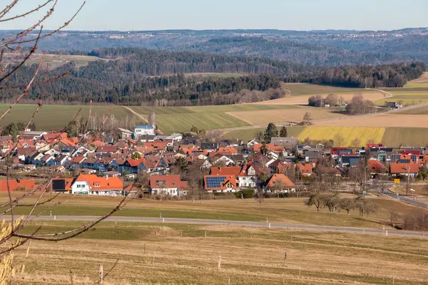 Little village in the middle of the german countryside with fore — Stock Photo, Image