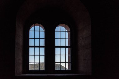 Windows of an old castle made of sandstone