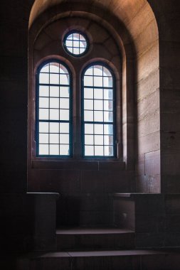 Windows of an old castle made of sandstone