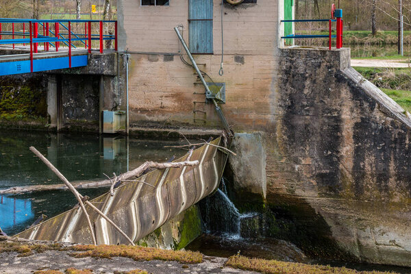 Controlled weir by the river to dam the water