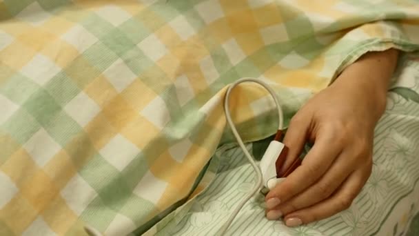 Health concept. medical finger sensor on female patient thumb. Narrow angle shot of medical equipment in hospital room. 4k — Stock Video