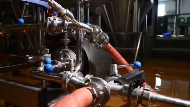 Modern complex technological industrial equipment. A plurality of pipelines, pumps, filters, gauges, sensors, motors and other parts of brewery production. 4k — Stock Footage Modern complex technological industrial equipment. A plurality of pipelines, pumps, filters, gauges, sensors, motors and other parts of brewery production. 4k Royalty Free Stock Footage