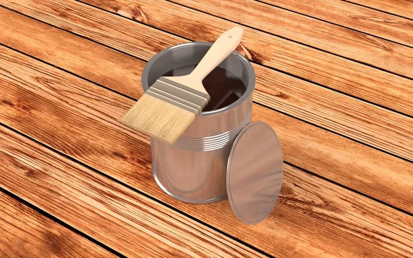 Can of wood varnish and brush