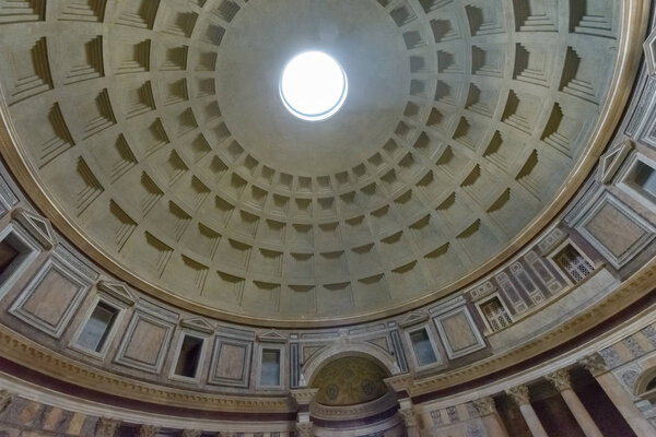 Hole in the roof of pantheon rome Italy from where sun is peeking through