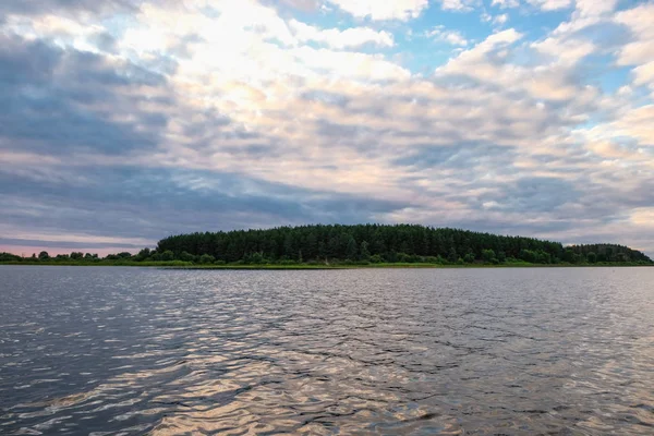 Sunset on Lake Lyubyaz in Ukraine. Water tourism.