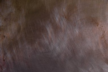 Soyut desenli koyu bakır bir yüzey. Cilalamadan sonra çizikler. Boşluğu kopyala.