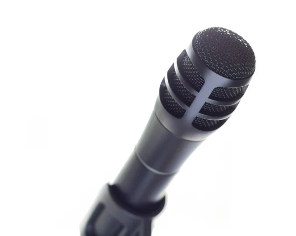 Гладкий Черный Микрофон Подставке Перед Открытым Белым Пространством — стоковое фото
