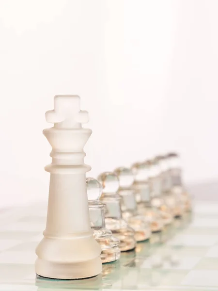 Glass Chess Pieces Set Line Glass Chess Board Pawns Standing — Stock Photo, Image