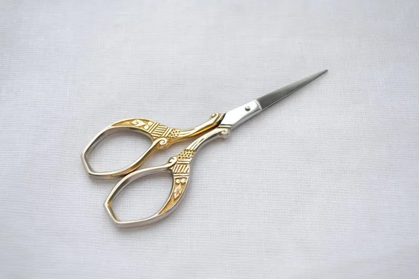 Beautiful Elegant Silver Scissors Sewing Manicure Scissors White Fabric — Stock Photo, Image