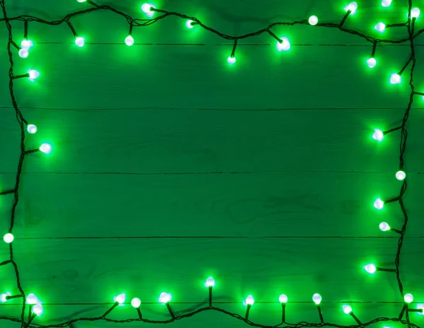 fairy lights on wooden background