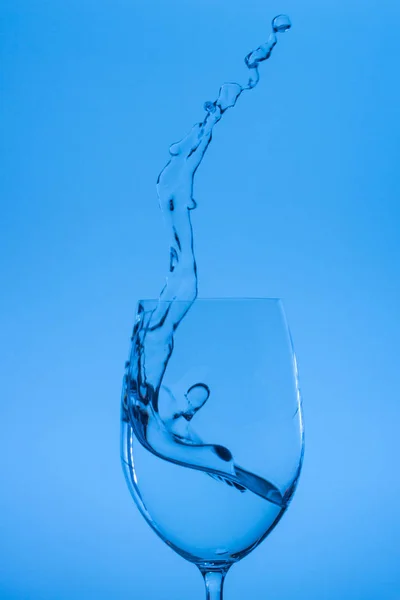 water pouring into wine glass