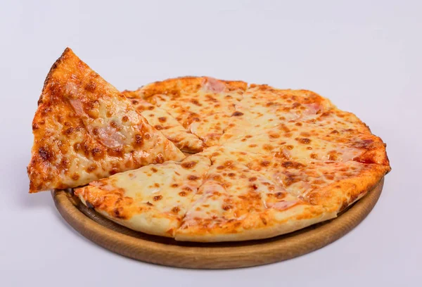 Tasty pizza on a white background. Pizza with sausage and cheese, a slice of pizza.