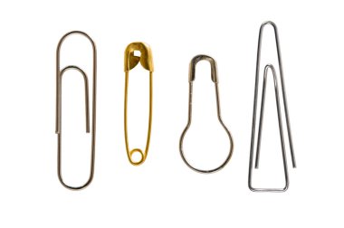 Staples and pins on a white background. clipart