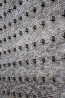 Küp tuğla blok taş döşeme ve Dikişsiz desen duvar üzerinde.