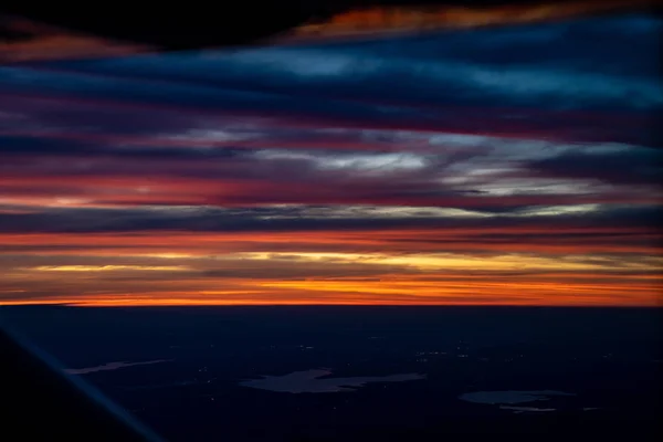 Twilight to Night from the jet plane view red orange blue sky wi — Stock Photo, Image