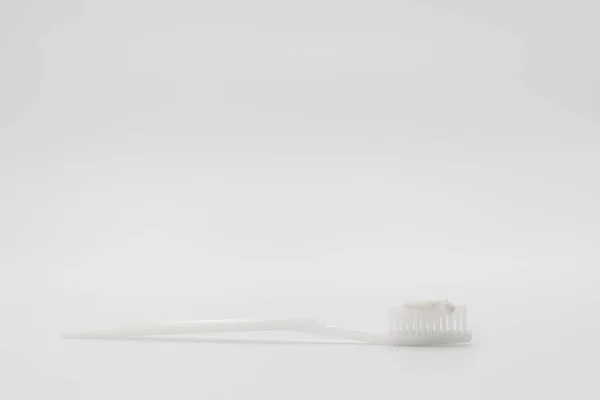 Isolated Simple Normal White Toothbrush Small Toothpaste White Background Studio — Stock Photo, Image