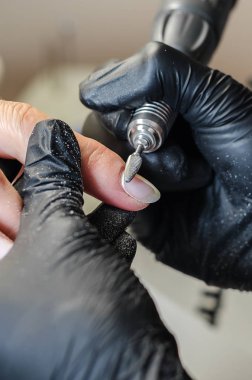 Asıl Güzellik Salonu donanım Manikür yok. Temizleme jeli vernik ile jel gomalak vernik ile bir tasarım uygulama çıkarmak, pterjium ve kütikül kaldırma bir freze kesici ile.