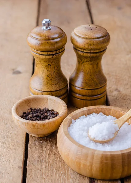 Seasoning saltcellar pepper shaker and a bowl of sea.