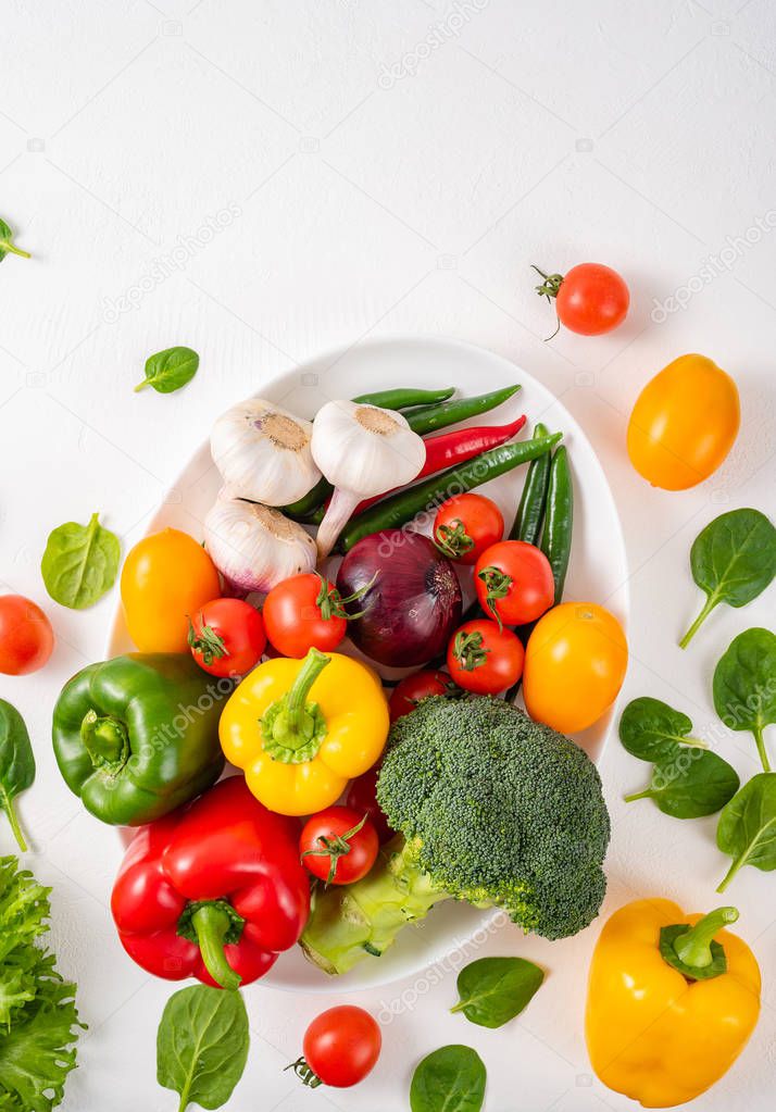 Whole vegetables on a white background.