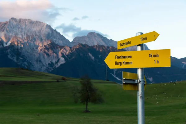 countryside and trails of an area of Austria with the mountains in the background