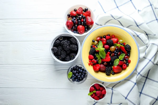 Berries Bowls Wooden Background Composition Raspberry Currant Strawberry Blueberries Gooseberries — Stock Photo, Image