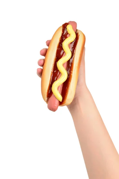 Hot dog στο χέρι γυναίκα απομονώνονται σε λευκό φόντο. Αντιγραφή χώρου. — Φωτογραφία Αρχείου