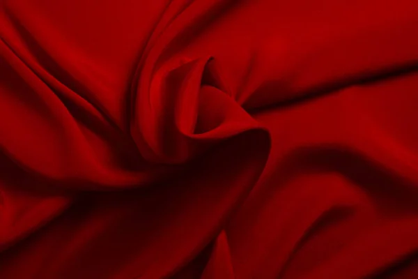 赤いシルクやサティンの高級生地の質感は、抽象的なバックとして使用することができます — ストック写真