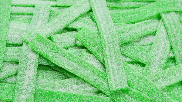 Grön saftig gummy godis bakgrund. Högst upp. Gelégodis. — Stockfoto