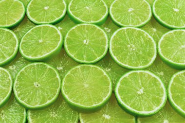 Arkaplan olarak taze limon dilimleri. 