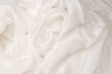 Yumuşak beyaz ipek kumaş arka plan. Kumaş dokusu. 