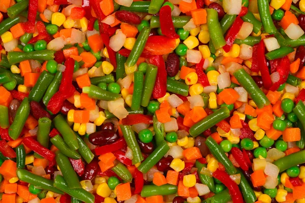 Legumes em fatias, milho, feijão, ervilhas, cenouras, pimentas doces bac — Fotografia de Stock