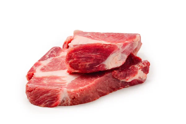 Carne di maiale cruda isolata su sfondo bianco. — Foto Stock