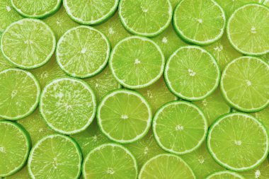Arkaplan olarak taze limon dilimleri. 