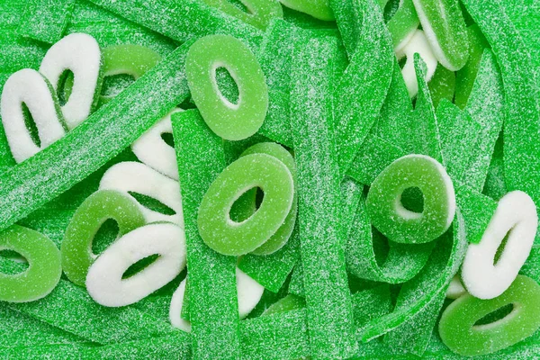 Blandade gröna gummy godis bakgrund. Högst upp. Gelégodis — Stockfoto
