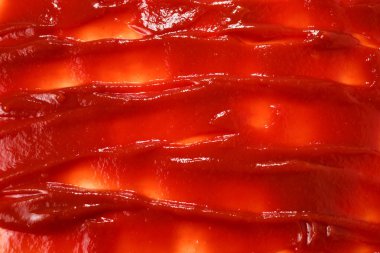 Kırmızı sos arka plan olarak sıçrar.