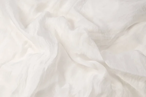Fondo suave y liso de tela de seda blanca. Textura de tela. —  Fotos de Stock