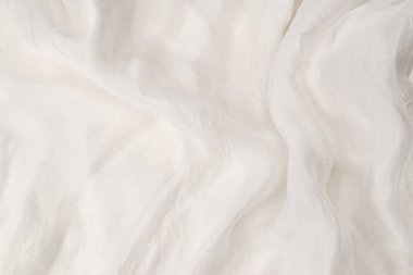 Yumuşak beyaz ipek kumaş arka plan. Kumaş dokusu. 