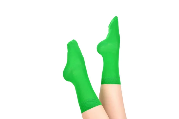 Woman in green socks isolated on white background. Top view. — Stock Photo, Image