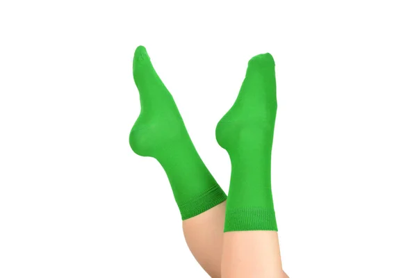 Frau in grünen Socken isoliert auf weißem Hintergrund. Ansicht von oben. — Stockfoto