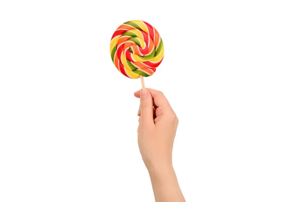 Lollipop in female hand isolated on white  background. Space for — Stock Photo, Image