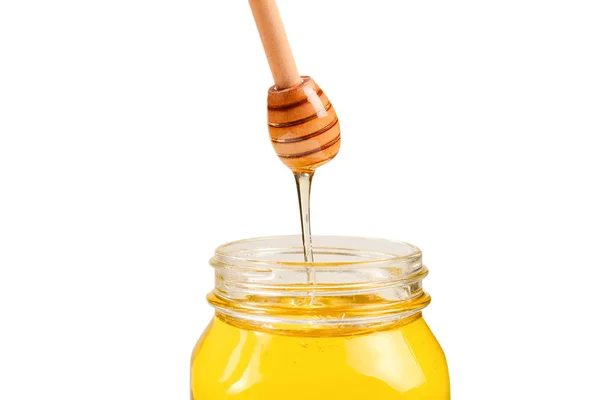 Dipper mit Honig in Frauenhand. Raum für Text oder Gestaltung. — Stockfoto