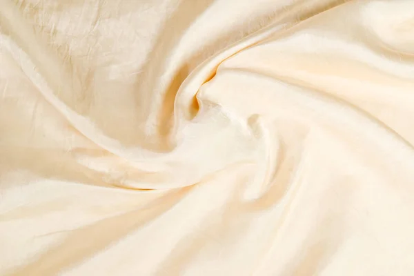Fondo suave de tela de seda beige liso. Textura de tela. —  Fotos de Stock