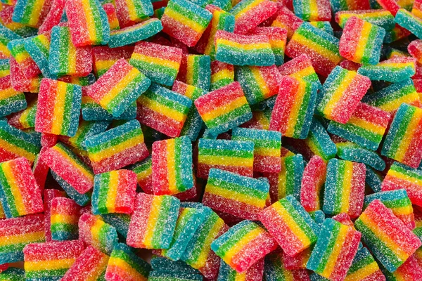 Regenbogen saftige Gummibärchen Hintergrund. Ansicht von oben. Geleesüße. — Stockfoto