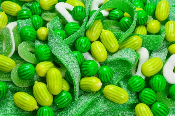 Assortiti caramelle gommose verdi sfondo. Vista dall'alto. Dolci alla gelatina — Foto Stock